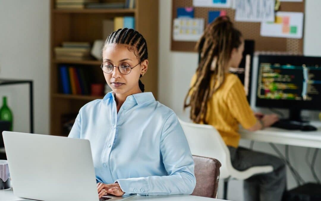 IT Professionals work in office